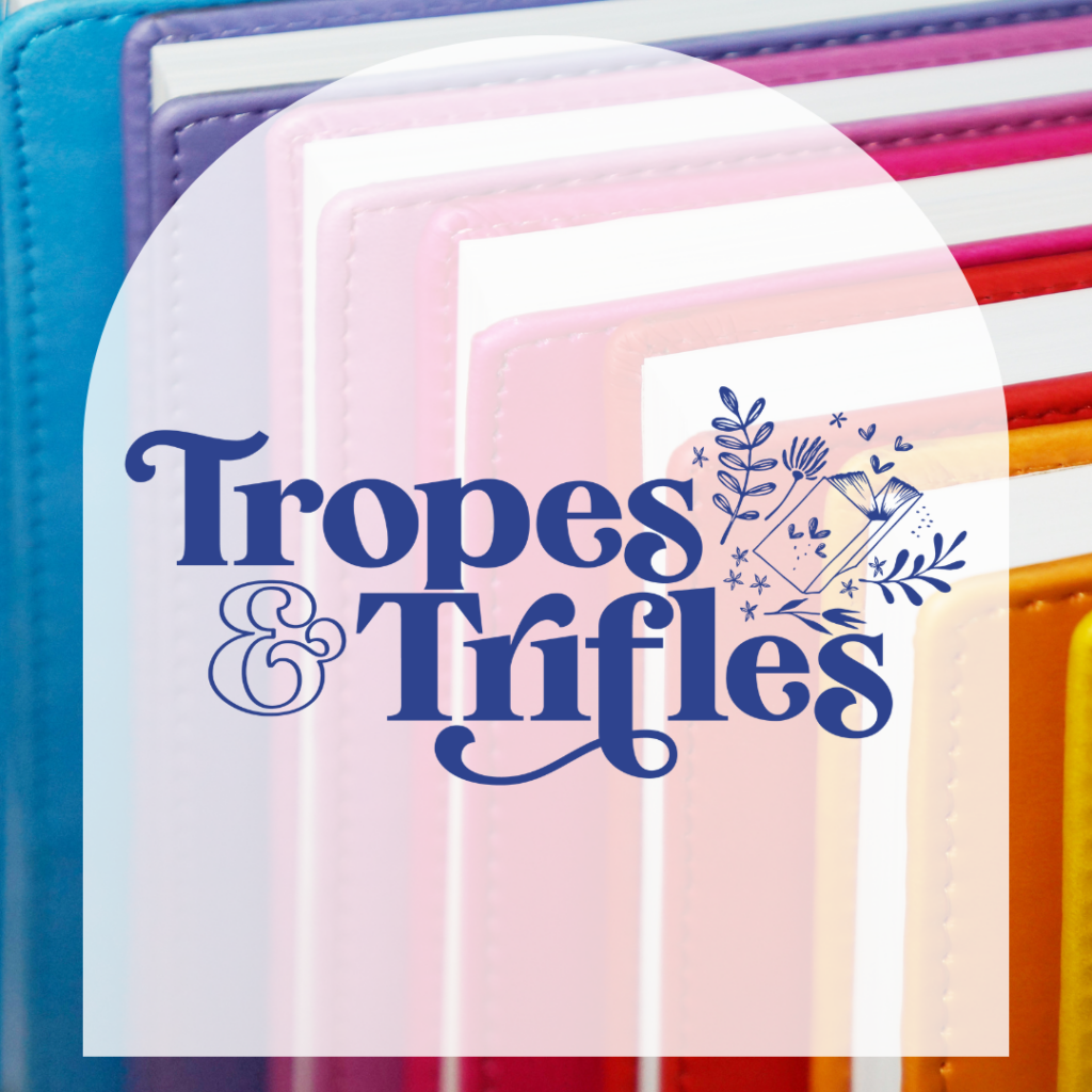 Picture of rainbow books with white arch in front if it that says "Tropes & Trifles"