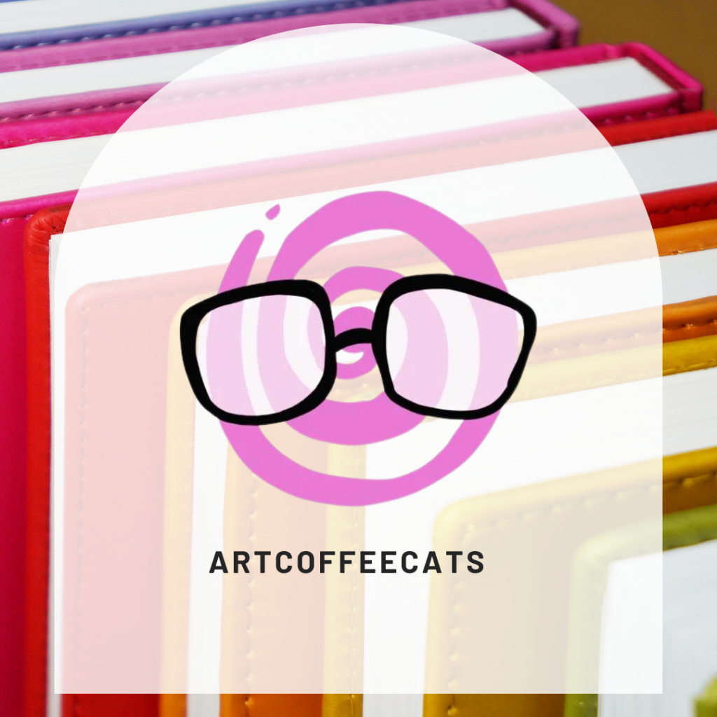 Picture of rainbow books with white arch in front if it that says "artcoffeecats"