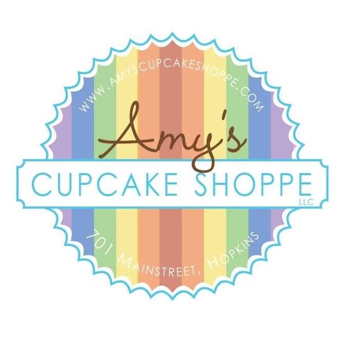 Circle with rainbow stripes that says "Amy's Cupcake Shoppe"